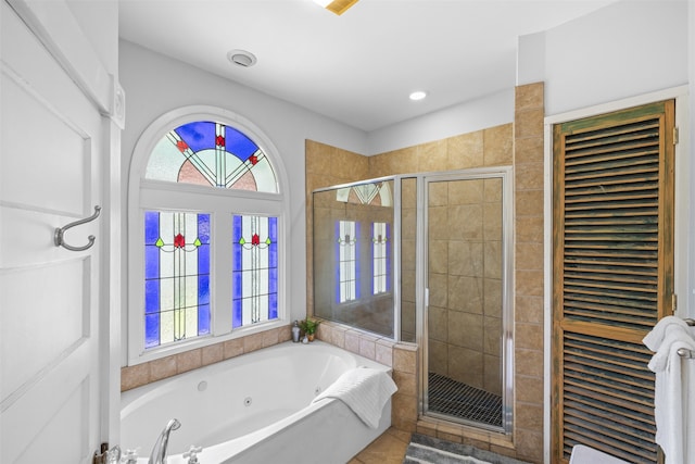 bathroom with plus walk in shower and tile patterned floors