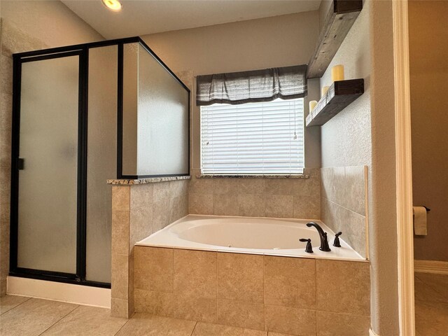 bathroom featuring tile patterned floors and plus walk in shower