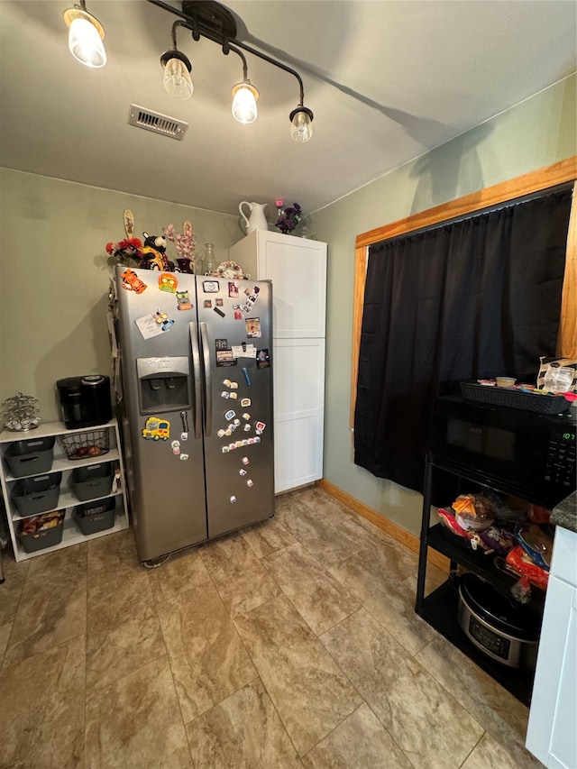 interior space with light tile patterned floors