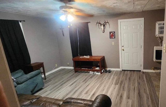 interior space with light wood-type flooring and ceiling fan