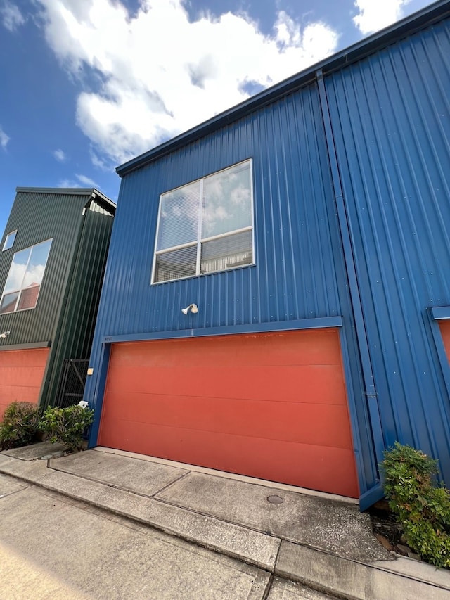 view of home's exterior featuring a garage