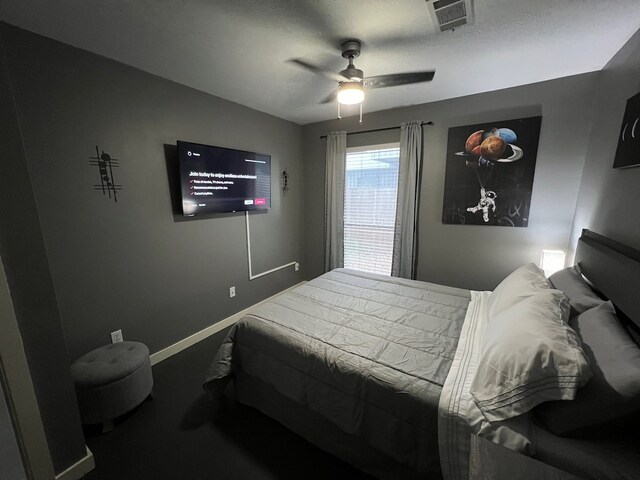 bedroom featuring ceiling fan and carpet flooring