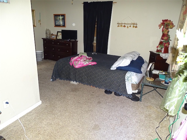 bedroom featuring carpet floors