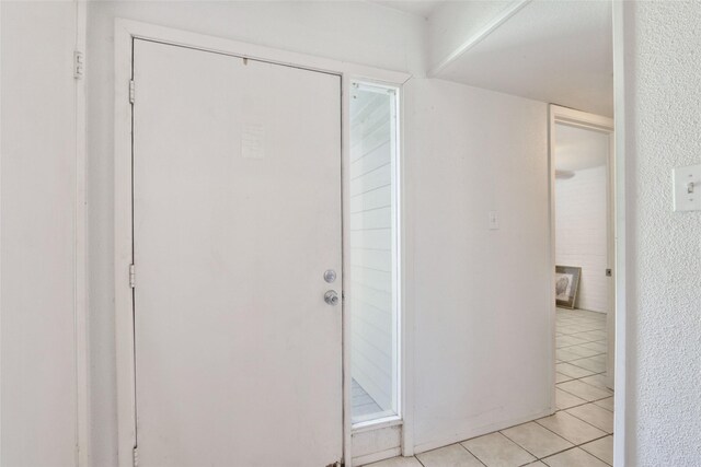 interior space featuring light tile patterned flooring