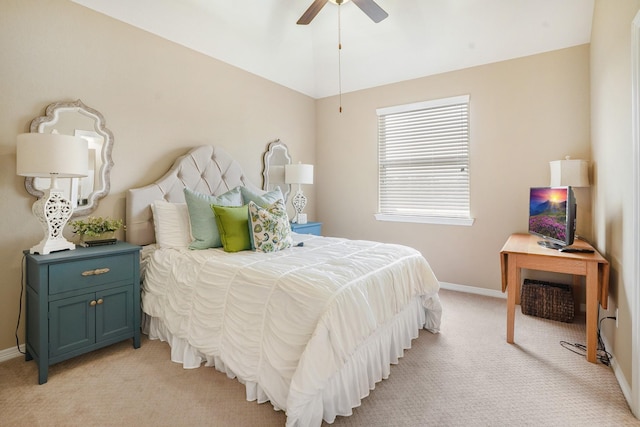 carpeted bedroom featuring ceiling fan and lofted ceiling