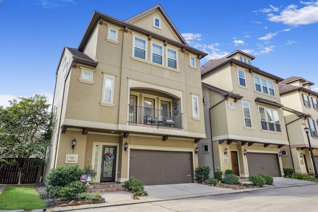 townhome / multi-family property featuring a garage