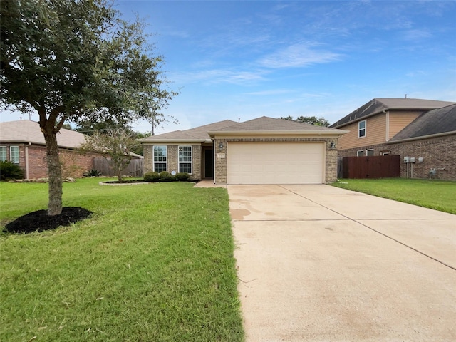 ranch-style house featuring a garage and a front yard