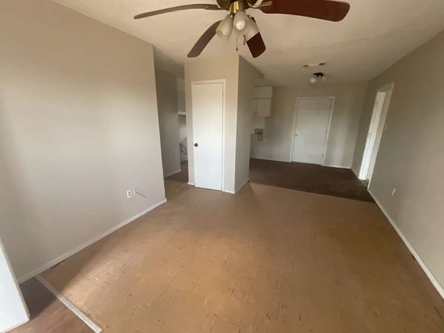 unfurnished bedroom featuring ceiling fan and hardwood / wood-style floors