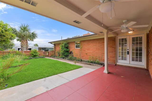 view of patio with french doors and ceiling fan