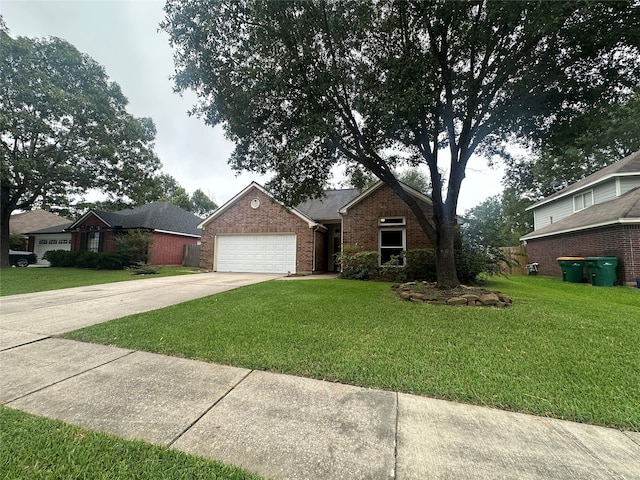 view of front facade featuring a front lawn and a garage