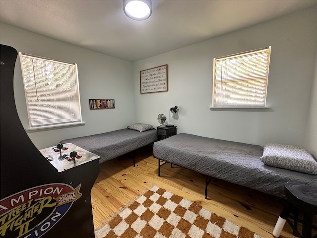 bedroom with light wood-type flooring