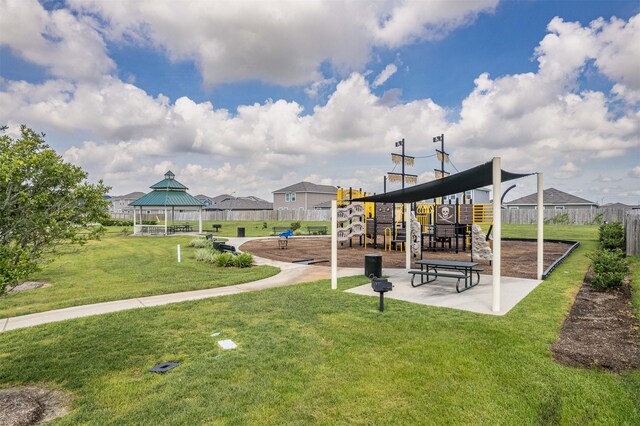 exterior space featuring a yard and a gazebo