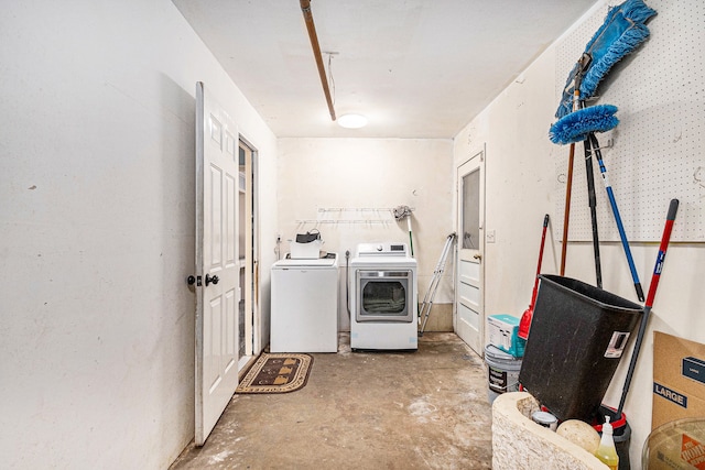 laundry room featuring washing machine and dryer