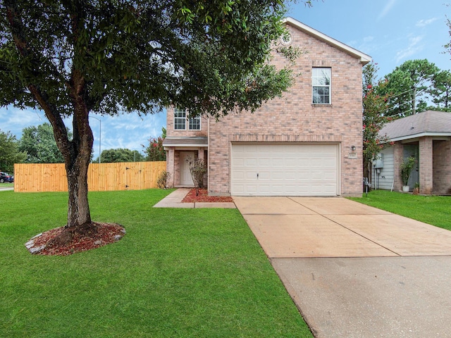 view of front of property with a garage and a front lawn