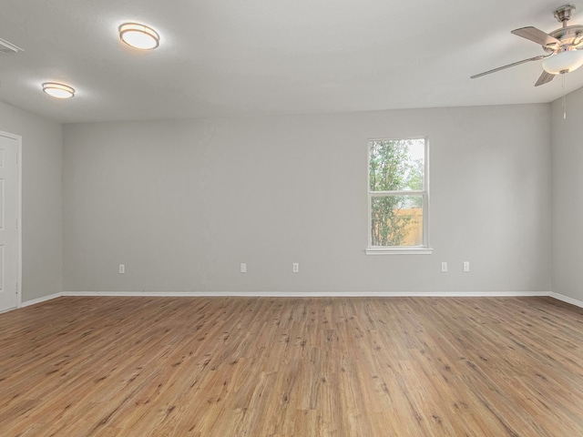 unfurnished room with ceiling fan and light hardwood / wood-style floors