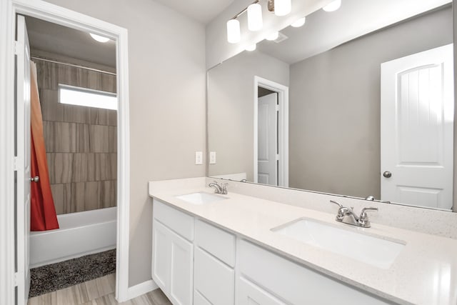 bathroom with double vanity, tile patterned flooring, and shower / tub combo