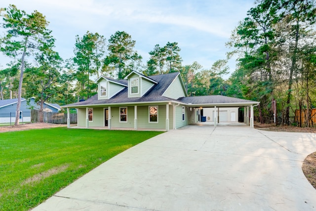 view of front of property featuring a garage, a carport, and a front yard