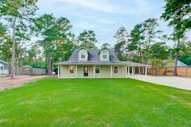 view of front of house with covered porch and a front lawn