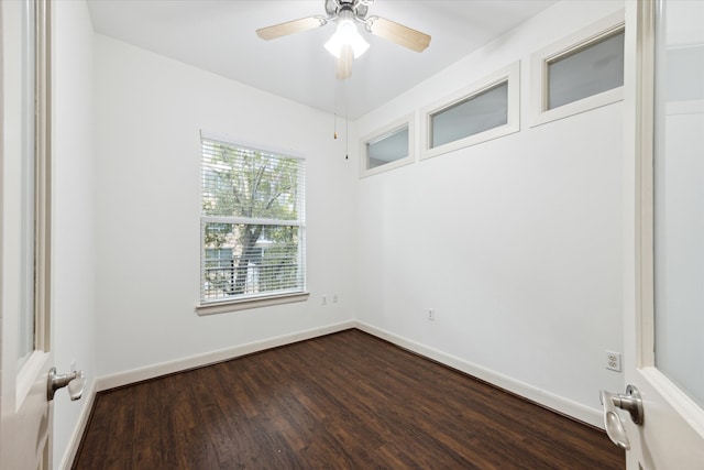 spare room with wood-type flooring and ceiling fan