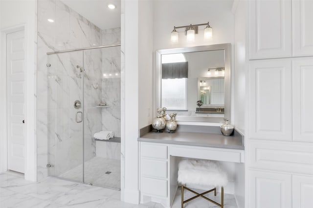 bathroom with vanity, an enclosed shower, and tile patterned flooring