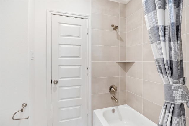 bathroom with shower / tub combo with curtain