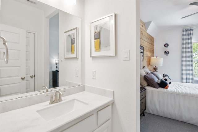 bathroom featuring vanity and ceiling fan