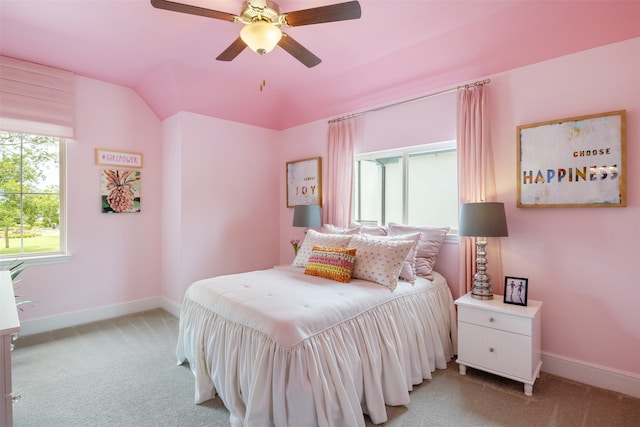 bedroom with light carpet, ceiling fan, and lofted ceiling