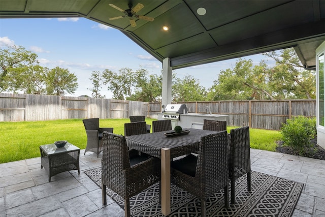 view of patio / terrace featuring ceiling fan and area for grilling