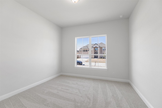 empty room featuring carpet floors