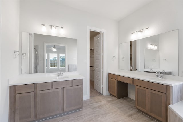 bathroom featuring vanity and walk in shower