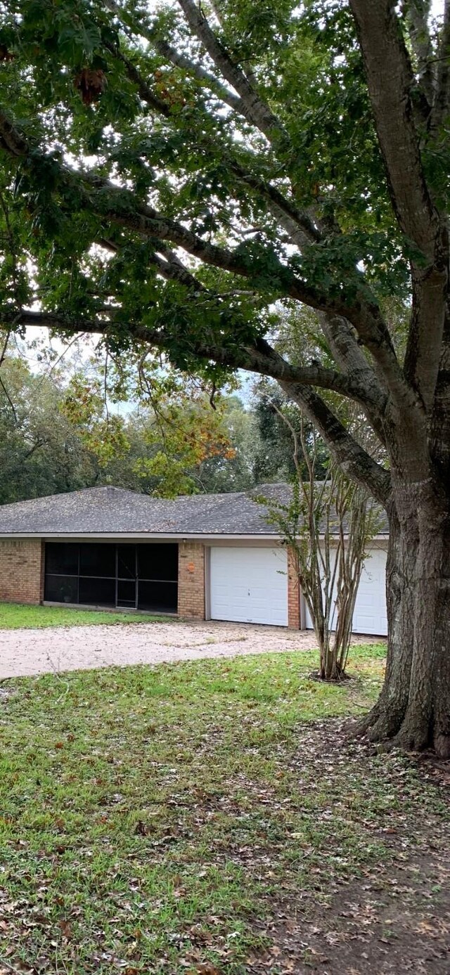 411 Sailfish St, Jones Creek, TX 77541 - view of garage
