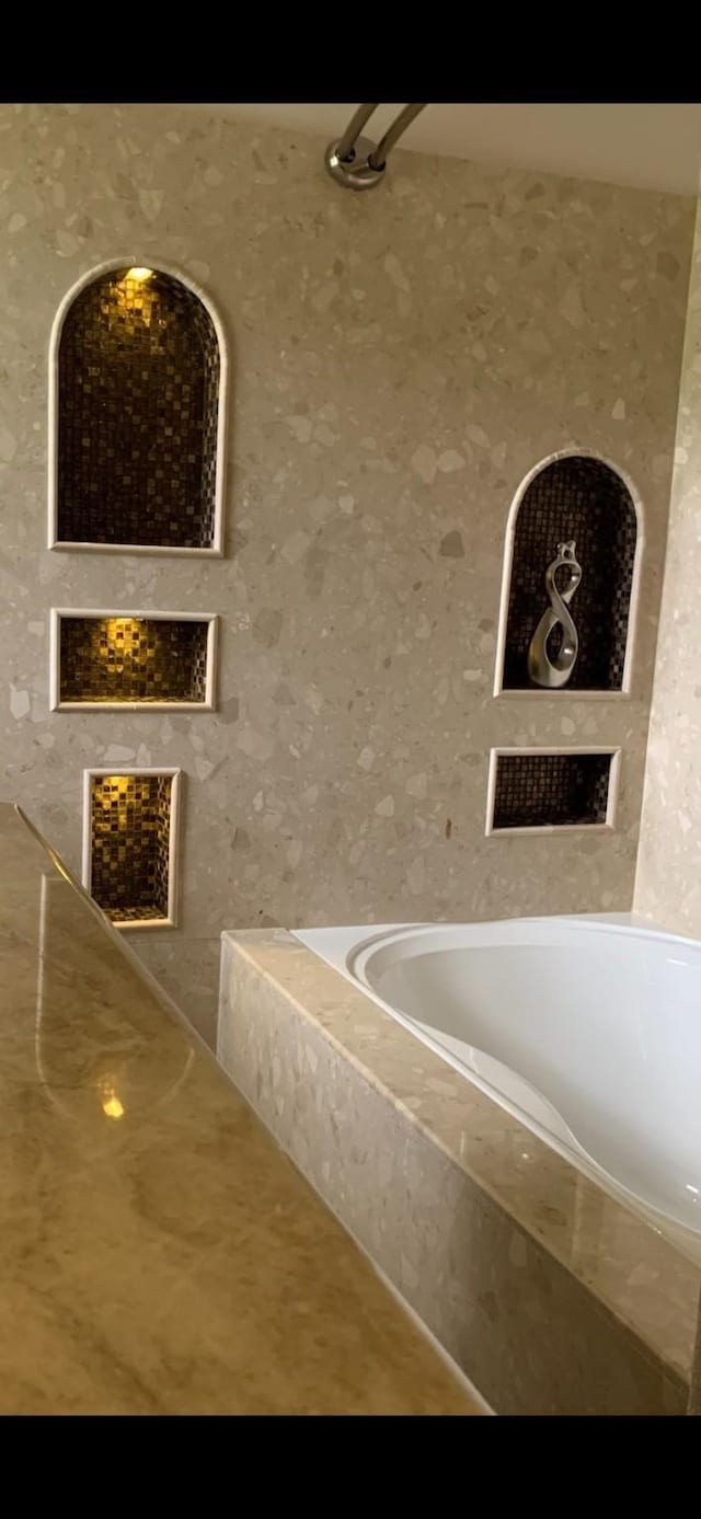 411 Sailfish St, Jones Creek, TX 77541 - bathroom with a tub
