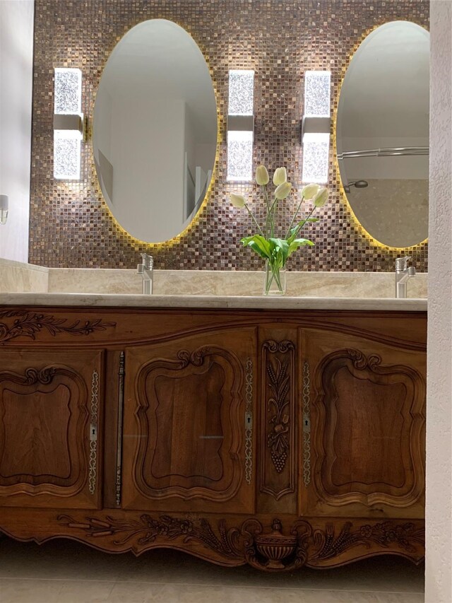 411 Sailfish St, Jones Creek, TX 77541 - bathroom with vanity and backsplash