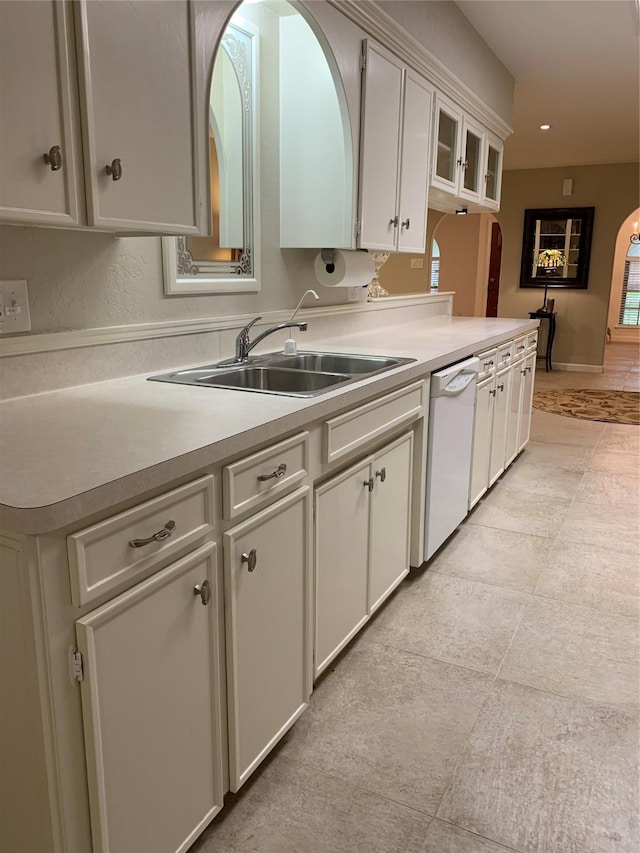 411 Sailfish St, Jones Creek, TX 77541 - kitchen featuring dishwasher, light countertops, arched walkways, white cabinets, and recessed lighting