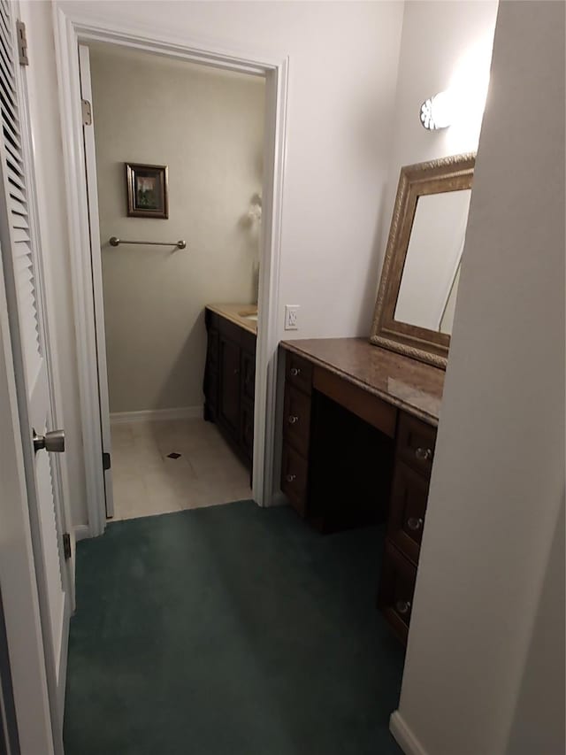 411 Sailfish St, Jones Creek, TX 77541 - bathroom with vanity and baseboards