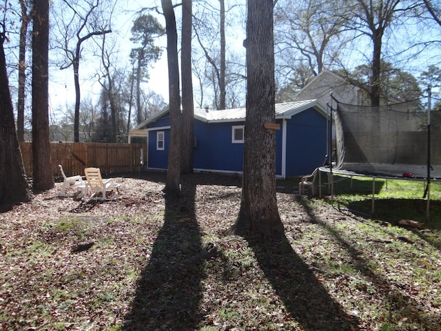 view of yard with a trampoline