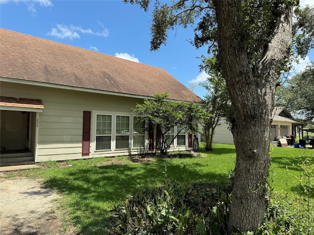 exterior space with a yard