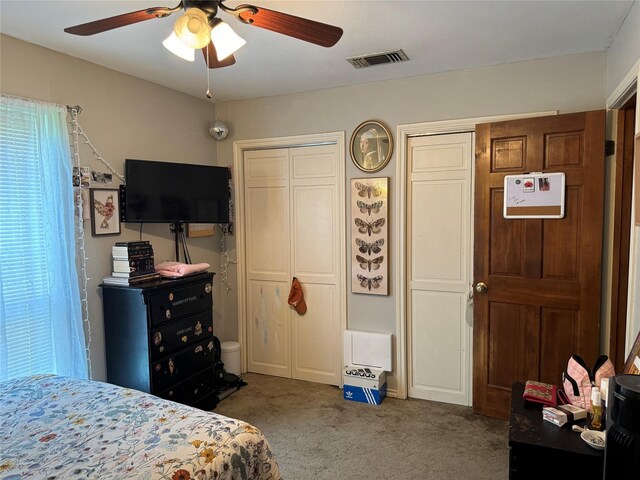 carpeted bedroom featuring ceiling fan