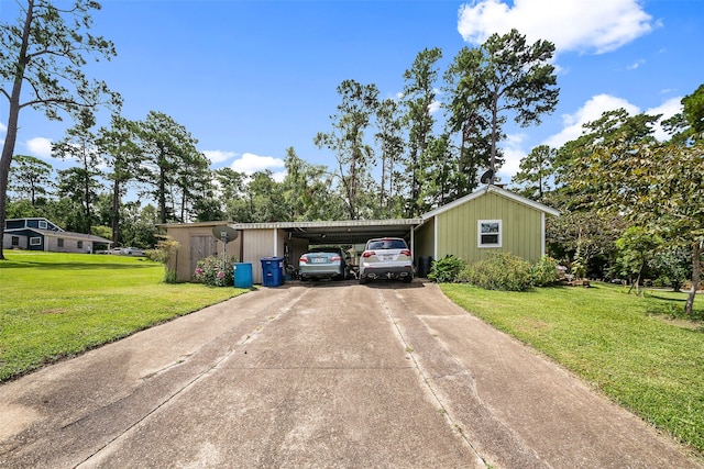 view of front of property featuring a carport and a front lawn