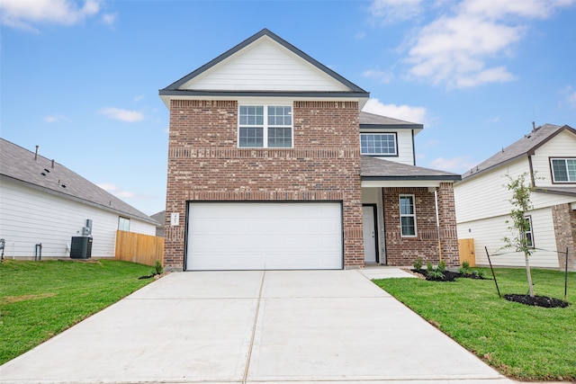 front facade with a garage, central AC unit, and a front yard