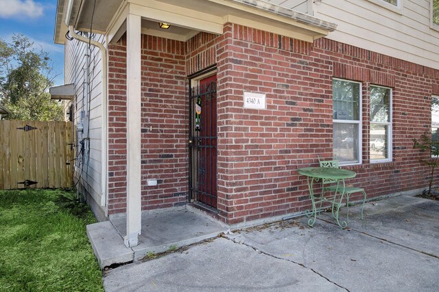 property entrance with a patio