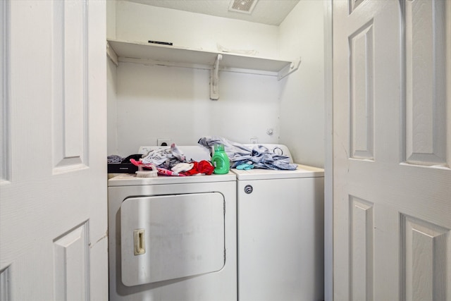 laundry area featuring washer and dryer