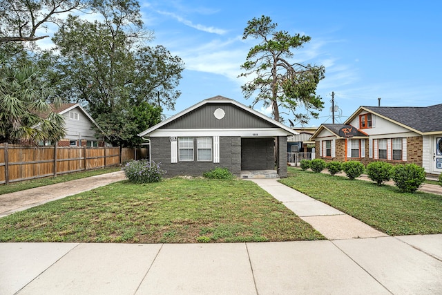 view of front of house with a front lawn