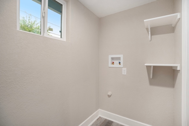 laundry area with washer hookup and hardwood / wood-style floors