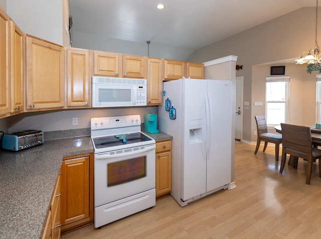 kitchen featuring an inviting chandelier, light wood-type flooring, white appliances, and vaulted ceiling