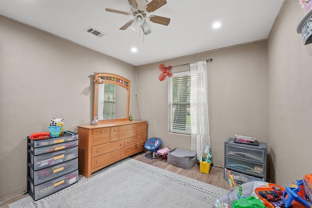 playroom featuring ceiling fan and wood-type flooring