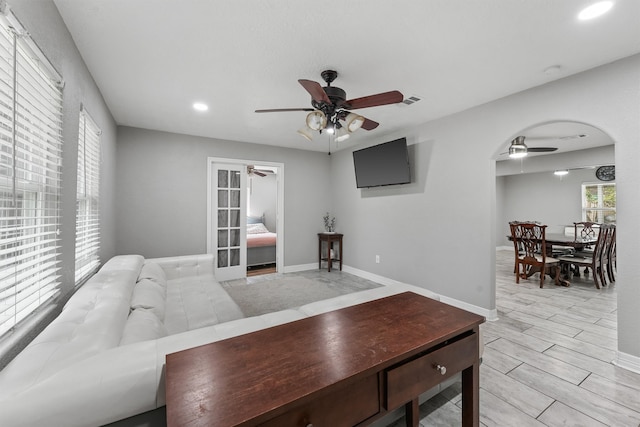 living room featuring ceiling fan