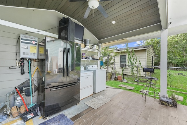 view of patio / terrace featuring ceiling fan and washing machine and clothes dryer