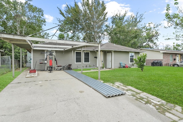 ranch-style home with a front yard