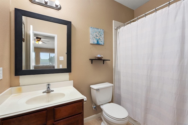 bathroom with walk in shower, vanity, and toilet